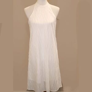 White sleeveless sundress with fun texture design
